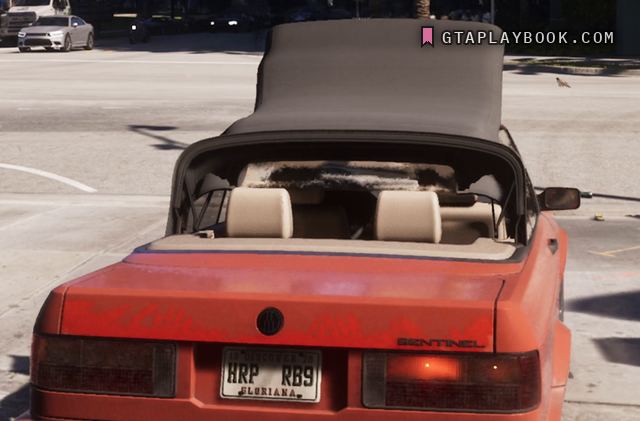 Red convertible — rear