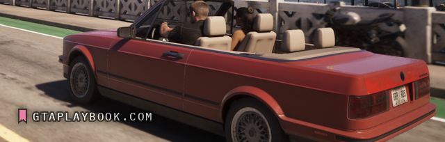 Red convertible — side