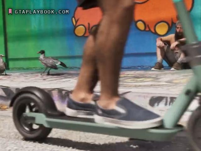 Mint-green electric scooter — side