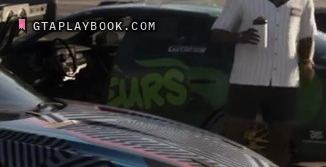 Tuner with green graffiti lettering in GTA 6