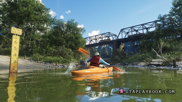 Mount Kalaga National Park — Kajakken op de rivier bij een peilschaal, met een