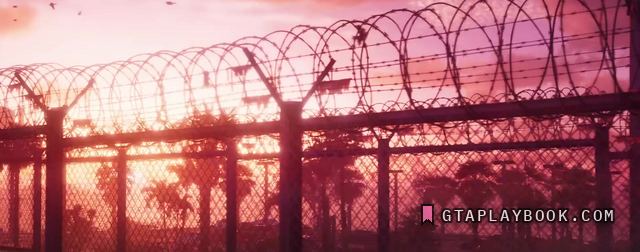 The correctional facility — Rollen prikkeldraad tegen avondlucht.