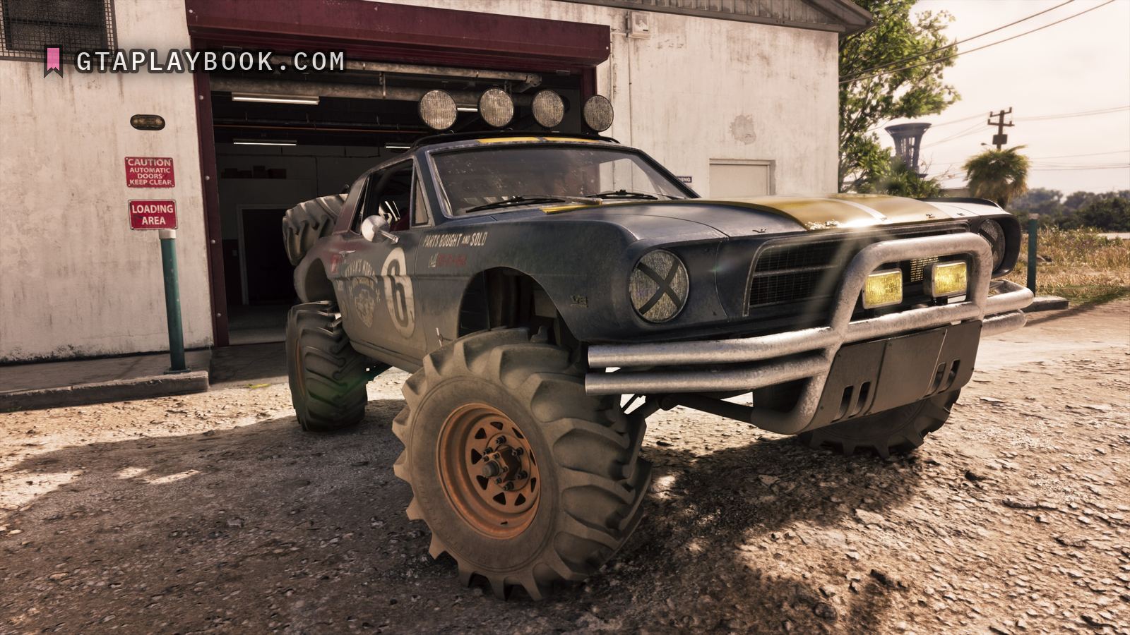 The '67 Vapid Dominator Buggy in a Rockstar studio render, a sixties coupe lifted onto tractor tyres outside a workshop